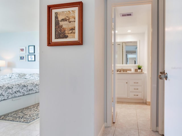 660 Island Way Unit 703, Clearwater Beach, FL 33767 - corridor with light tile patterned floors and baseboards