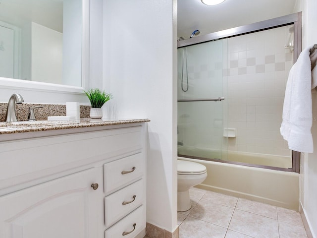 660 Island Way Unit 703, Clearwater Beach, FL 33767 - bathroom with vanity, tile patterned flooring, and shower / bath combination with glass door