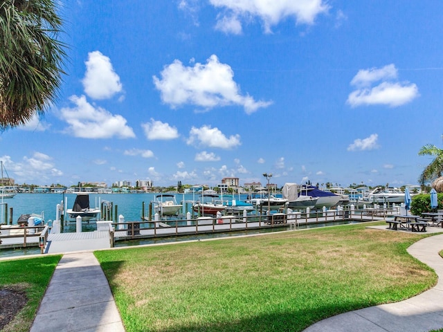 660 Island Way Unit 703, Clearwater Beach, FL 33767 - dock featuring a lawn and a water view