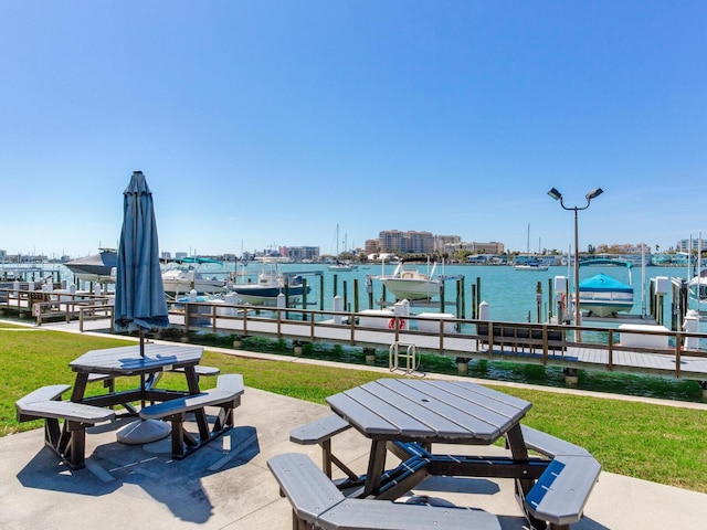 660 Island Way Unit 703, Clearwater Beach, FL 33767 - view of home's community featuring a dock, boat lift, a yard, and a water view