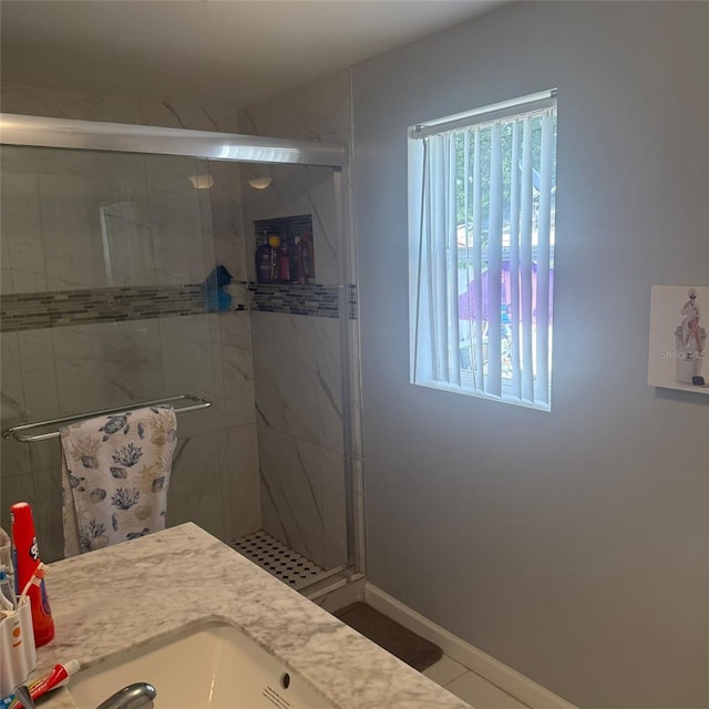 10004 Ethel St, Gibsonton, FL 33534 - bathroom with a shower stall and vanity
