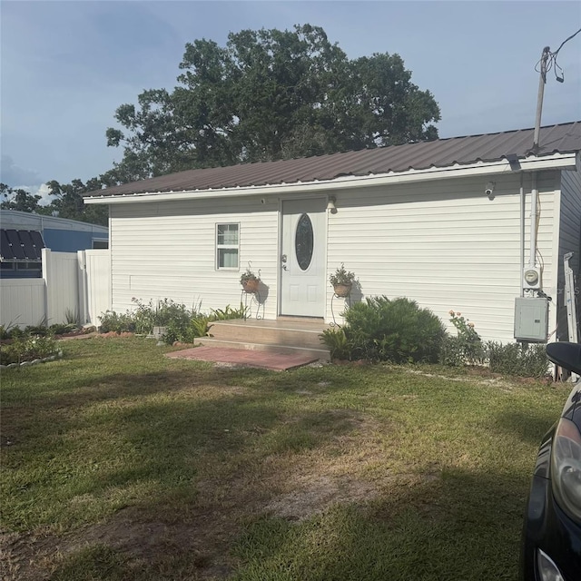 10004 Ethel St, Gibsonton, FL 33534 - ranch-style house with a metal roof