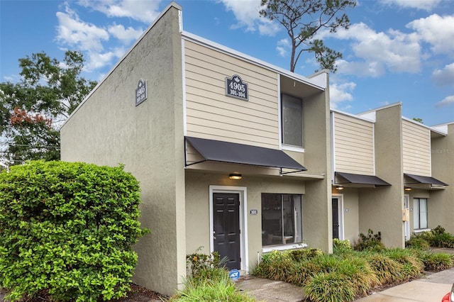 4905 25th St W Unit 101, Bradenton, FL 34207 - view of front of house featuring stucco siding
