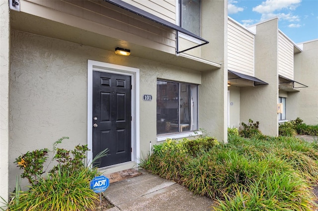 4905 25th St W Unit 101, Bradenton, FL 34207 - property entrance with stucco siding