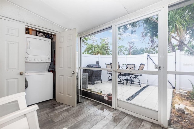 4905 25th St W Unit 101, Bradenton, FL 34207 - sunroom / solarium featuring stacked washer and clothes dryer