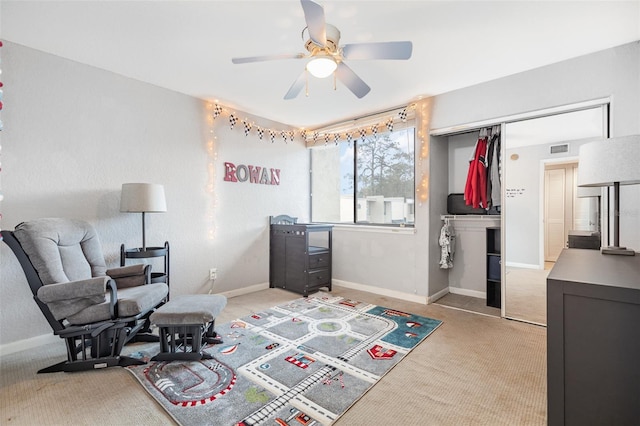4905 25th St W Unit 101, Bradenton, FL 34207 - sitting room featuring a ceiling fan and carpet