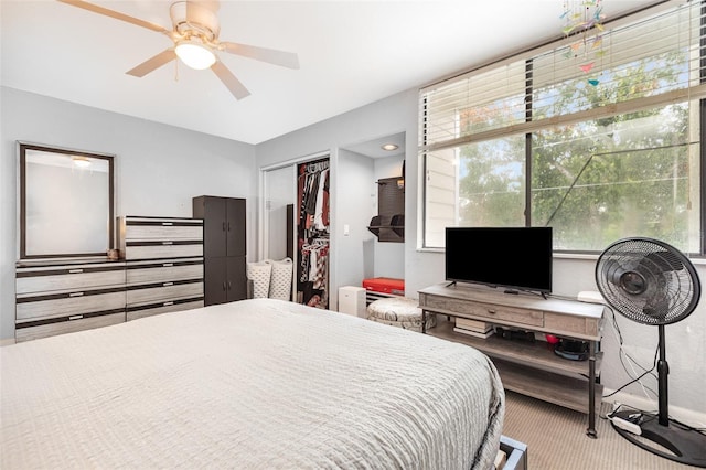4905 25th St W Unit 101, Bradenton, FL 34207 - carpeted bedroom featuring a closet and ceiling fan