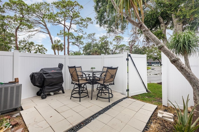 4905 25th St W Unit 101, Bradenton, FL 34207 - view of patio / terrace with grilling area and outdoor dining space