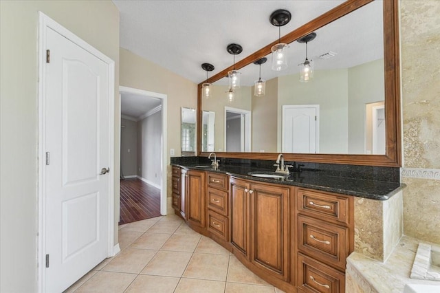 816 Sandringham Ln, Lutz, FL 33549 - bathroom featuring double vanity, tile patterned flooring, a tub, and crown molding
