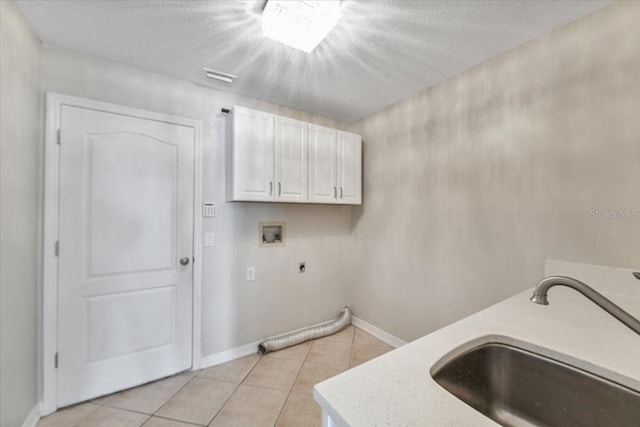 816 Sandringham Ln, Lutz, FL 33549 - laundry room with cabinet space, washer hookup, electric dryer hookup, and light tile patterned floors