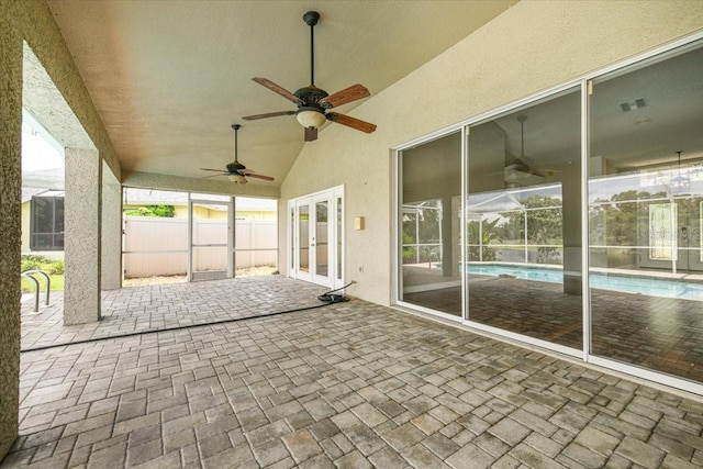 816 Sandringham Ln, Lutz, FL 33549 - unfurnished sunroom featuring french doors, a ceiling fan, and lofted ceiling