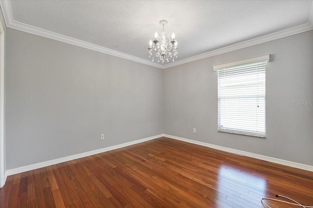 816 Sandringham Ln, Lutz, FL 33549 - unfurnished room featuring a chandelier, hardwood / wood-style floors, and crown molding