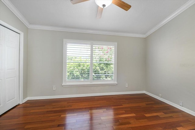 816 Sandringham Ln, Lutz, FL 33549 - unfurnished bedroom featuring dark wood-type flooring, ornamental molding, a closet, and a ceiling fan