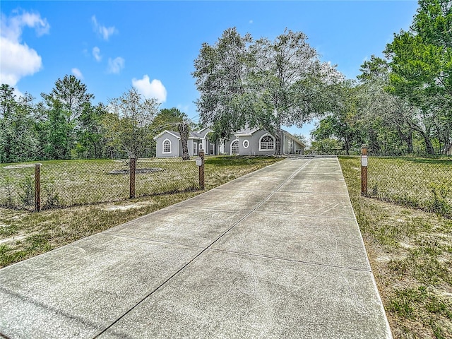 8303 Nightwalker Rd, Weeki Wachee, FL 34613 - view of front of house with driveway