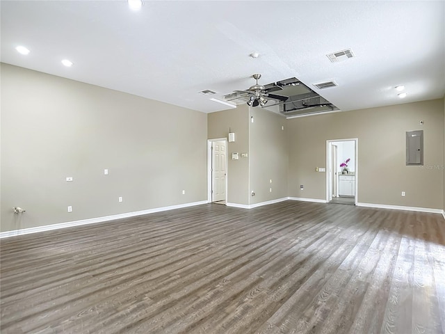 8303 Nightwalker Rd, Weeki Wachee, FL 34613 - unfurnished room featuring electric panel, ceiling fan, and wood finished floors