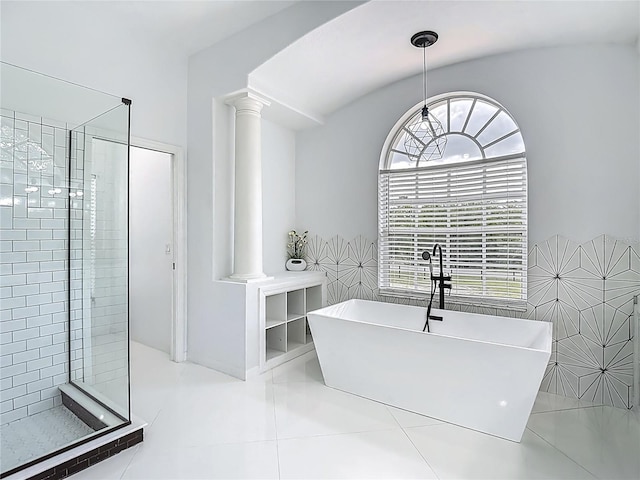 8303 Nightwalker Rd, Weeki Wachee, FL 34613 - bathroom featuring ornate columns, a soaking tub, a stall shower, and tile patterned floors