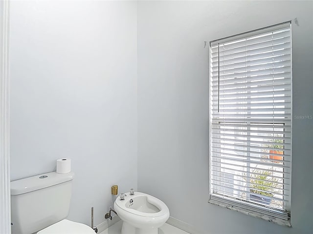 8303 Nightwalker Rd, Weeki Wachee, FL 34613 - bathroom with a bidet and toilet