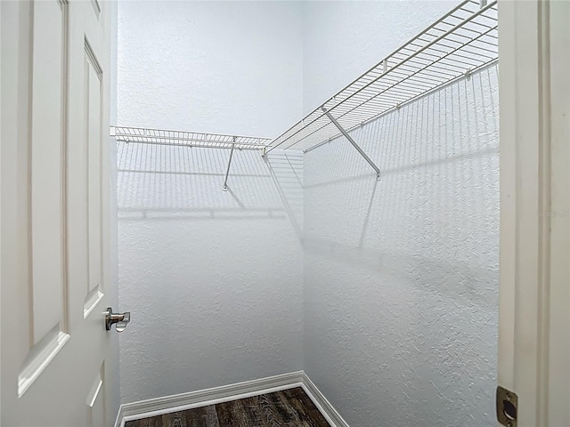 8303 Nightwalker Rd, Weeki Wachee, FL 34613 - spacious closet with wood finished floors