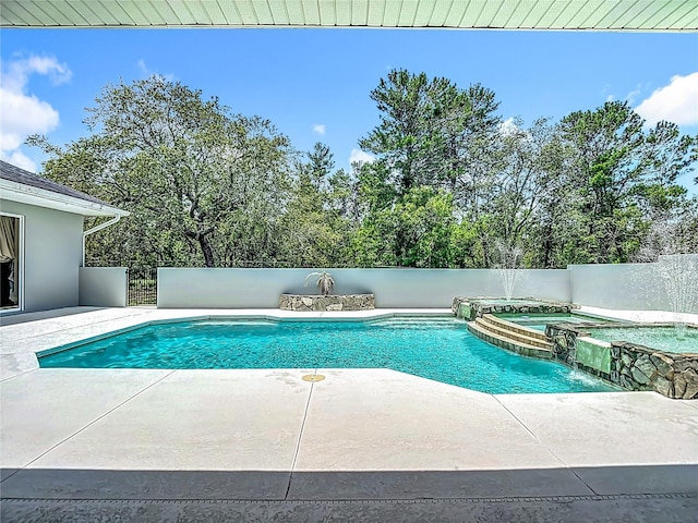 8303 Nightwalker Rd, Weeki Wachee, FL 34613 - view of pool featuring a pool with connected hot tub and a patio area