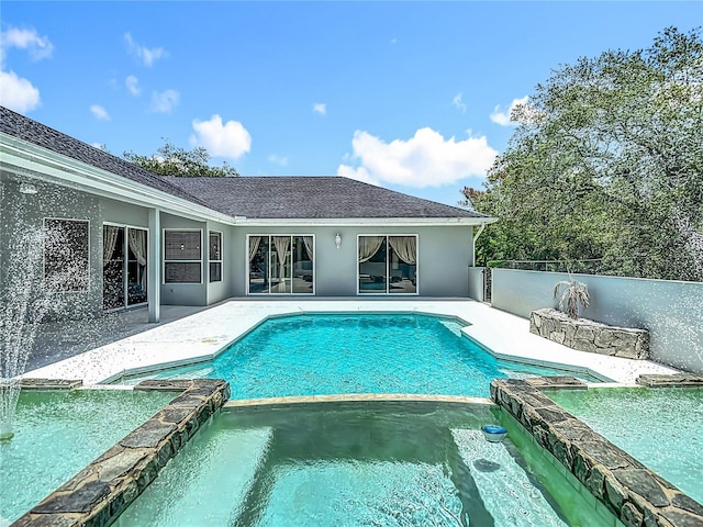 8303 Nightwalker Rd, Weeki Wachee, FL 34613 - view of swimming pool featuring a pool with connected hot tub and a patio