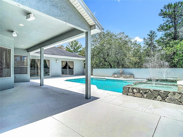 8303 Nightwalker Rd, Weeki Wachee, FL 34613 - view of pool featuring a patio and a pool with connected hot tub