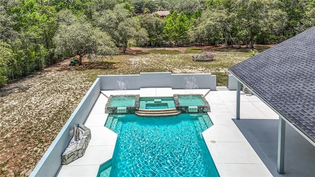 8303 Nightwalker Rd, Weeki Wachee, FL 34613 - view of swimming pool with a pool with connected hot tub and a patio area