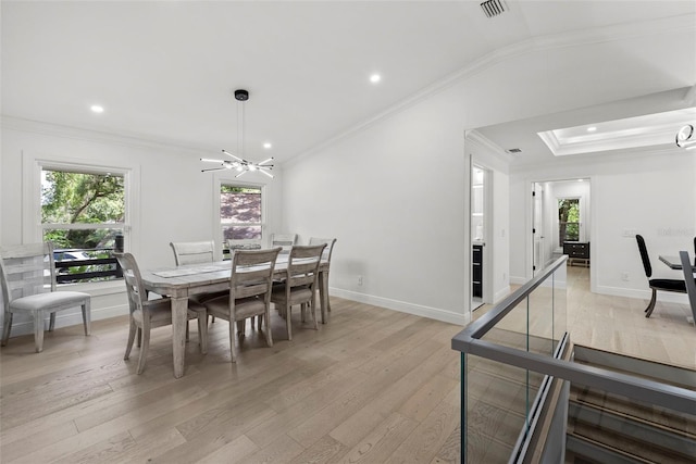 900 Oak Hollow Pl, Brandon, FL 33510 - dining area featuring ornamental molding, light wood-style flooring, a chandelier, and recessed lighting