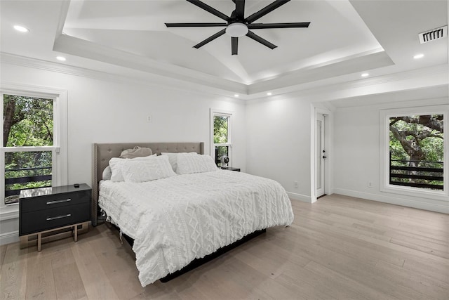 900 Oak Hollow Pl, Brandon, FL 33510 - bedroom featuring multiple windows, a raised ceiling, recessed lighting, crown molding, and vaulted ceiling