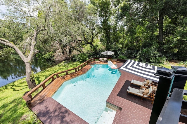 900 Oak Hollow Pl, Brandon, FL 33510 - outdoor pool with view of scattered trees and a deck with water view