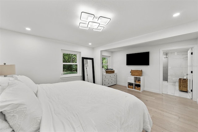900 Oak Hollow Pl, Brandon, FL 33510 - bedroom featuring wood finished floors, recessed lighting, and ensuite bathroom