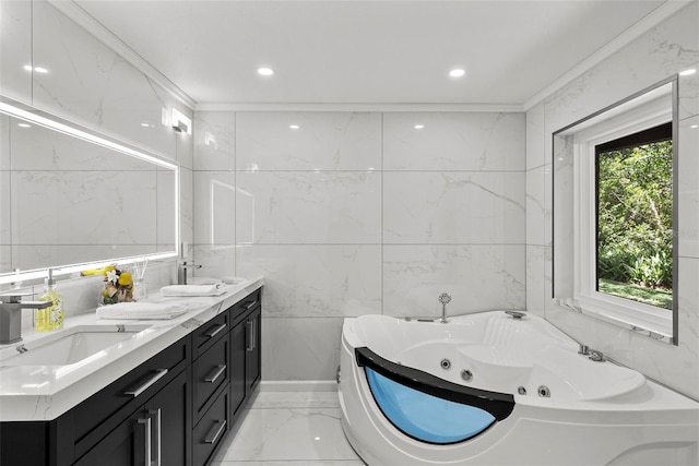 900 Oak Hollow Pl, Brandon, FL 33510 - full bath featuring marble tiled flooring, double vanity, a tub with jets, tile walls, and crown molding