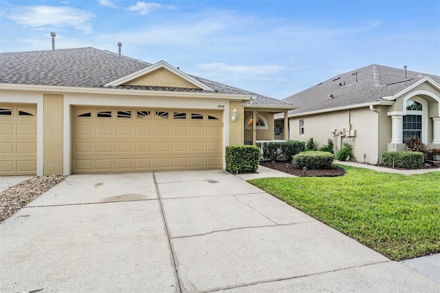 19351 Haskell Pl, Land O Lakes, FL 34638 - ranch-style home with stucco siding, concrete driveway, a garage, and roof with shingles
