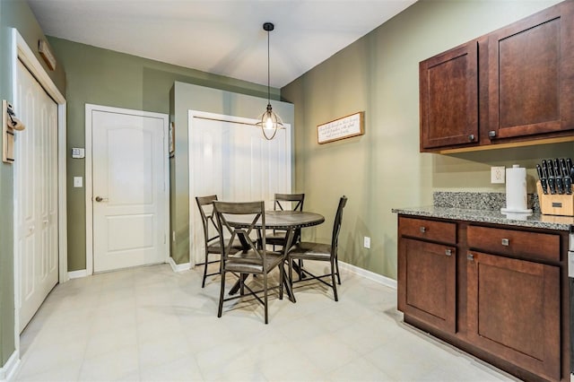 19351 Haskell Pl, Land O Lakes, FL 34638 - dining area featuring baseboards