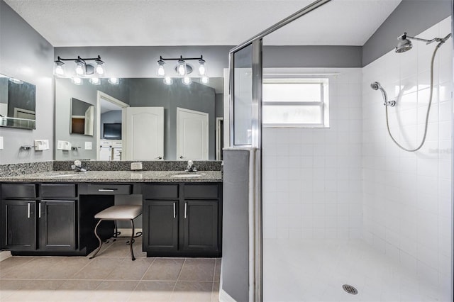 19351 Haskell Pl, Land O Lakes, FL 34638 - full bathroom featuring a stall shower, tile patterned flooring, and double vanity