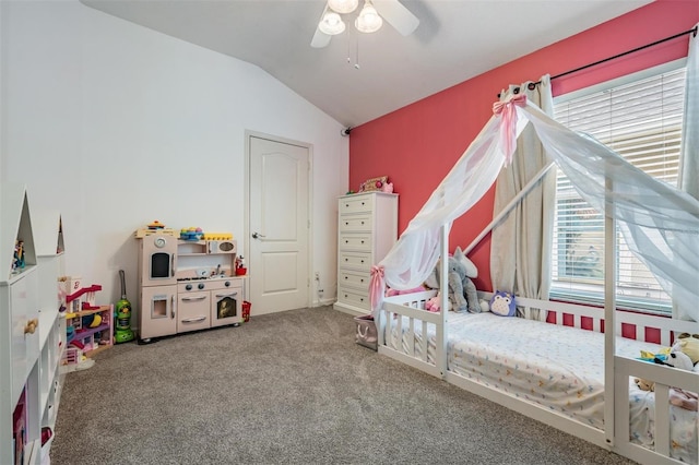 19351 Haskell Pl, Land O Lakes, FL 34638 - carpeted bedroom featuring vaulted ceiling, multiple windows, and ceiling fan
