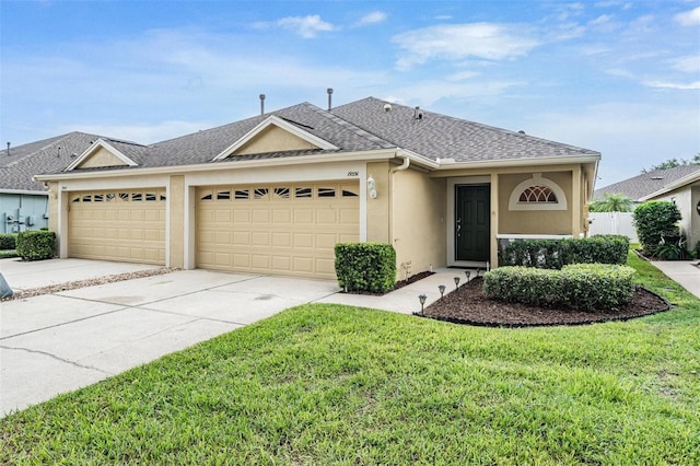 19351 Haskell Pl, Land O Lakes, FL 34638 - ranch-style home featuring an attached garage, stucco siding, driveway, and a front lawn