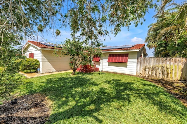 557 Crystal Dr, Madeira Beach, FL 33708 - back of house featuring solar panels