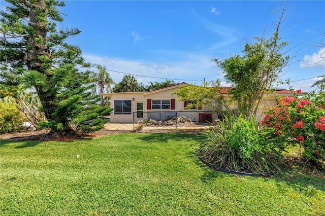 557 Crystal Dr, Madeira Beach, FL 33708 - rear view of house with stucco siding