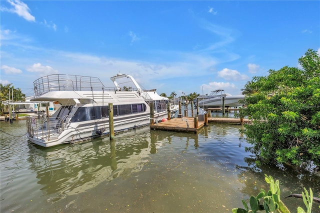 557 Crystal Dr, Madeira Beach, FL 33708 - dock with a water view and boat lift