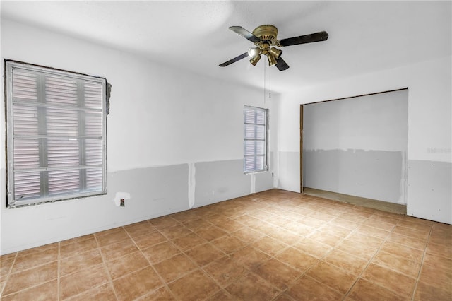 557 Crystal Dr, Madeira Beach, FL 33708 - empty room featuring ceiling fan