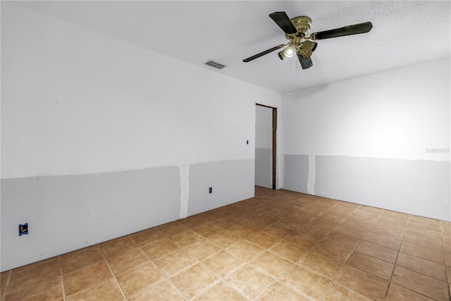 557 Crystal Dr, Madeira Beach, FL 33708 - unfurnished room featuring a ceiling fan