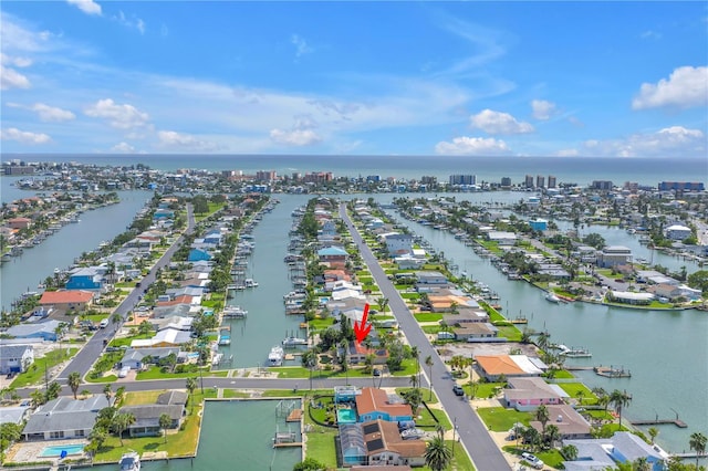 557 Crystal Dr, Madeira Beach, FL 33708 - aerial perspective of suburban area featuring a large body of water
