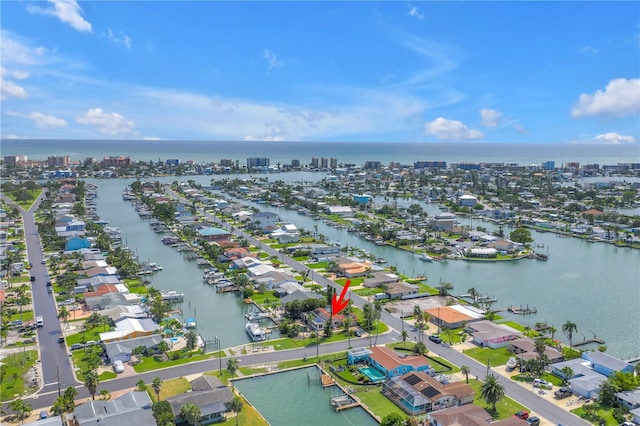 557 Crystal Dr, Madeira Beach, FL 33708 - aerial perspective of suburban area with a large body of water