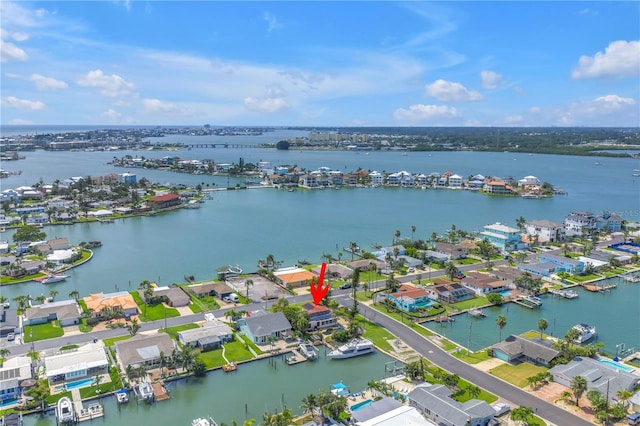 557 Crystal Dr, Madeira Beach, FL 33708 - aerial perspective of suburban area with a large body of water
