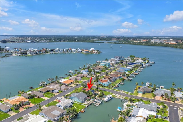 557 Crystal Dr, Madeira Beach, FL 33708 - aerial perspective of suburban area featuring a nearby body of water