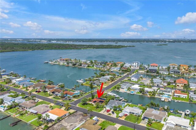 557 Crystal Dr, Madeira Beach, FL 33708 - aerial overview of property's location with a large body of water and nearby suburban area