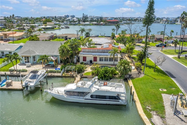557 Crystal Dr, Madeira Beach, FL 33708 - aerial perspective of suburban area featuring a nearby body of water