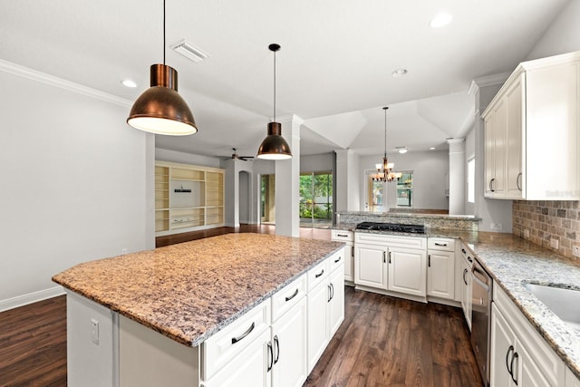 1304 Lorea Ln, Brandon, FL 33511 - kitchen featuring dark wood finished floors, dishwasher, recessed lighting, white cabinetry, and ornamental molding