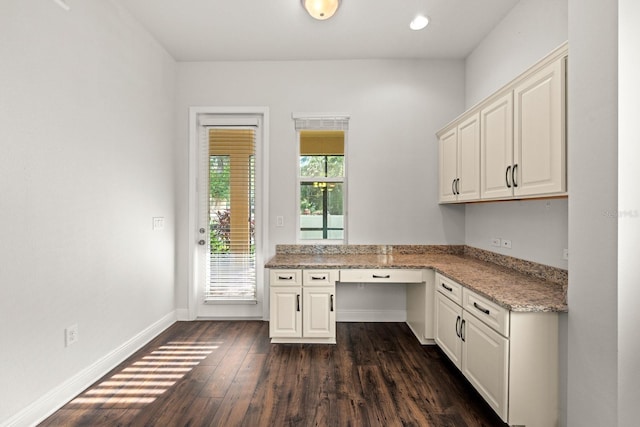 1304 Lorea Ln, Brandon, FL 33511 - unfurnished office with built in study area and dark wood-type flooring