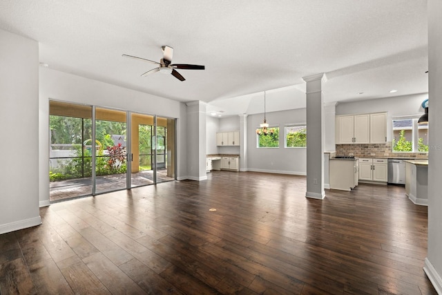 1304 Lorea Ln, Brandon, FL 33511 - unfurnished living room with a ceiling fan and dark wood finished floors